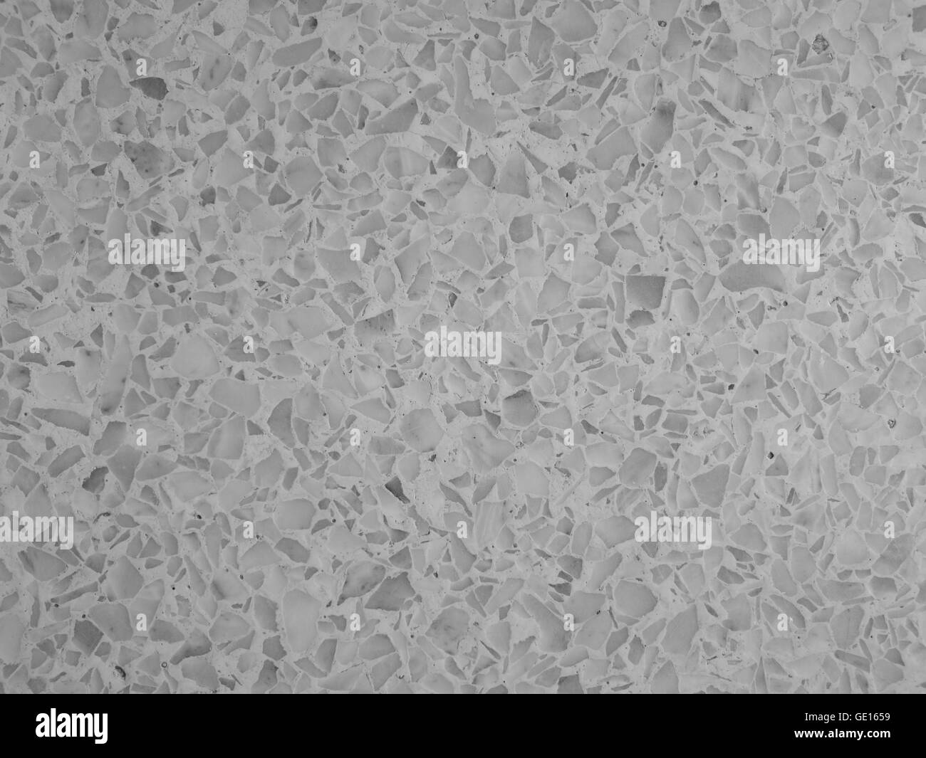 Terrazzo-Boden/Hintergrundtextur in Monochrom Stockfoto