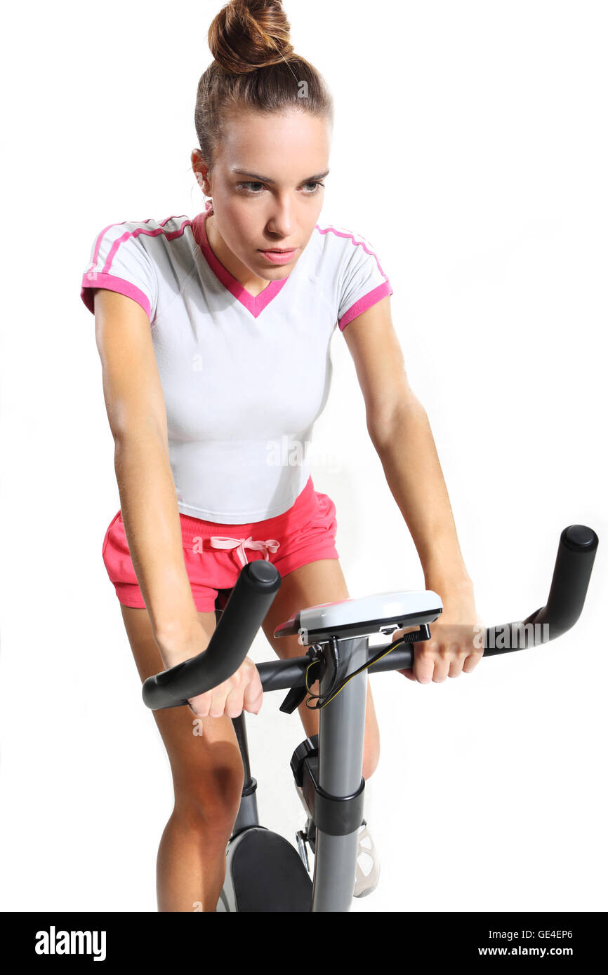 Frau auf Übung Fahrradpedale Stockfoto