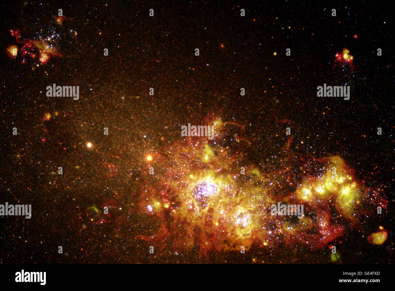 NGC 4214, 13 Millionen Lichtjahre von der Erde entfernt, ist eine Sternentstehungsgalaxie, die auf diesem Hubble-Bild sichtbar ist und den Prozess der Stern- und Sternentstehung in ihren Gas- und Staubwolken zeigt. Stockfoto NGC 4214, 13 Millionen Lichtjahre von der Erde entfernt, ist eine Sternentstehungsgalaxie, die auf diesem Hubble-Bild sichtbar ist und den Prozess der Stern- und Sternentstehung in ihren Gas- und Staubwolken zeigt. Stockfoto