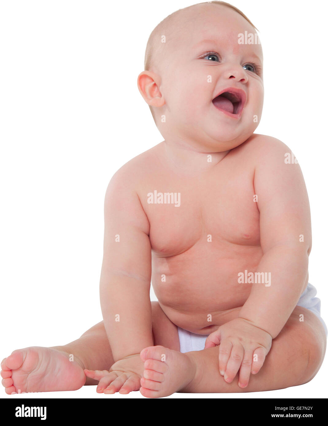 Ein Foto von Babyjungen suchen Weg niedlichen Kleinkind trägt Windel sitzt er isolierten auf weißen Hintergrund Stockfoto