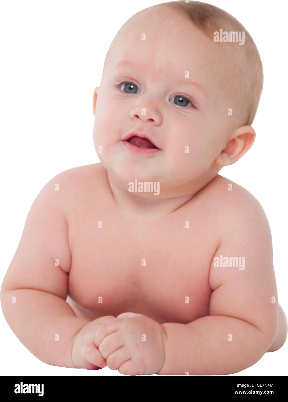 Ein Foto von niedlichen Kleinkind sucht entfernte Babyjungen liegt auf seinem Bauch ist er isoliert auf weißem Hintergrund Stockfoto