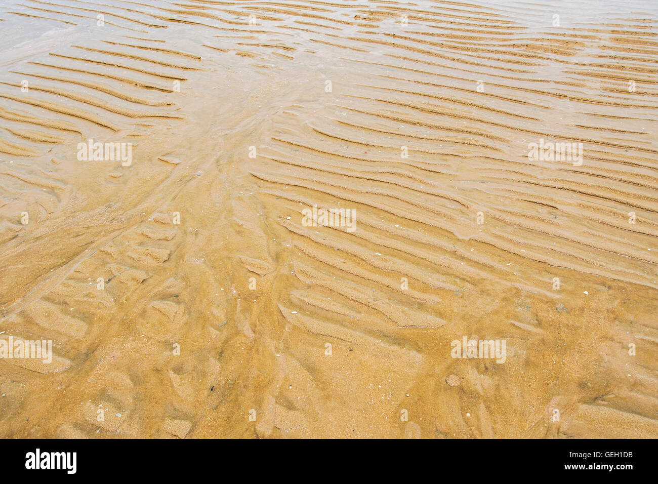 Strand Sand Wellen Stockfoto