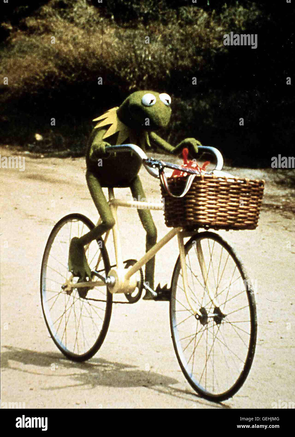 Kermit der Frosch Fährt Fahrrad... *** lokalen Caption *** 1979, Muppet Movie, Muppet Movie Stockfoto