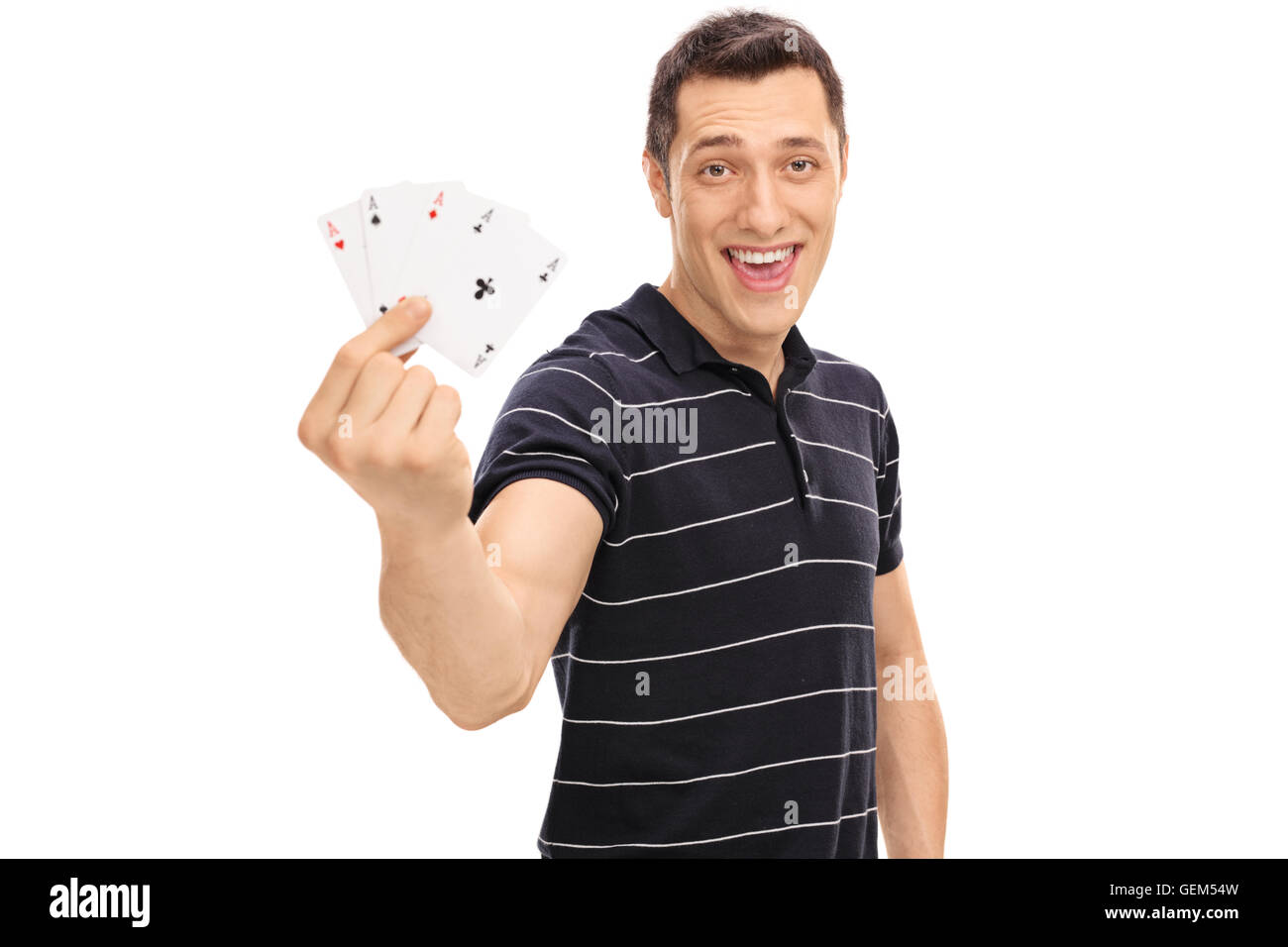 Glückspilz halten vier Asse und schaut in die Kamera, die isoliert auf weißem Hintergrund Stockfoto
