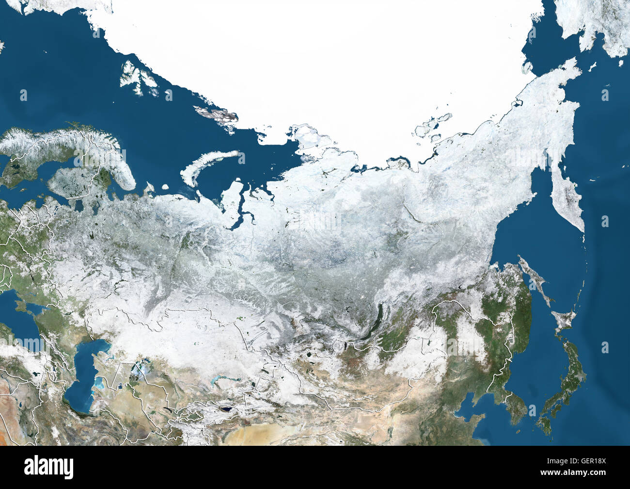 Satellitenansicht von Russland und Zentralasien im Winter, mit teilweise Schneedecke und arktische Eiskappe (mit Ländergrenzen). Dieses Bild wurde aus Daten von Satelliten Landsat 7 & 8 zusammengestellt. Stockfoto