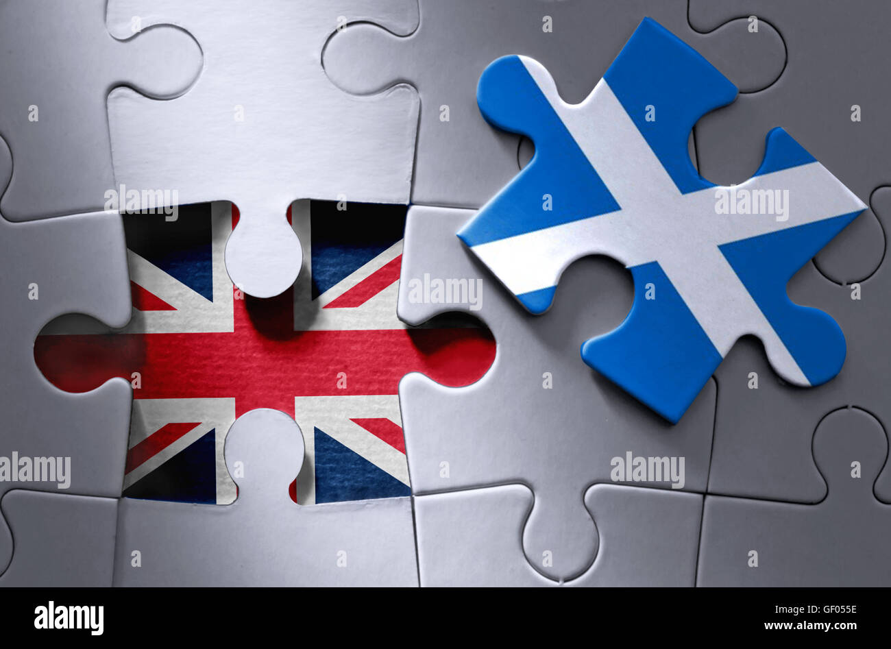 Fehlende Stück von einer UK Jigsaw Puzzle aufschlussreiche UK Flagge mit schottischen Flagge Puzzleteil auf der einen Seite Stockfoto