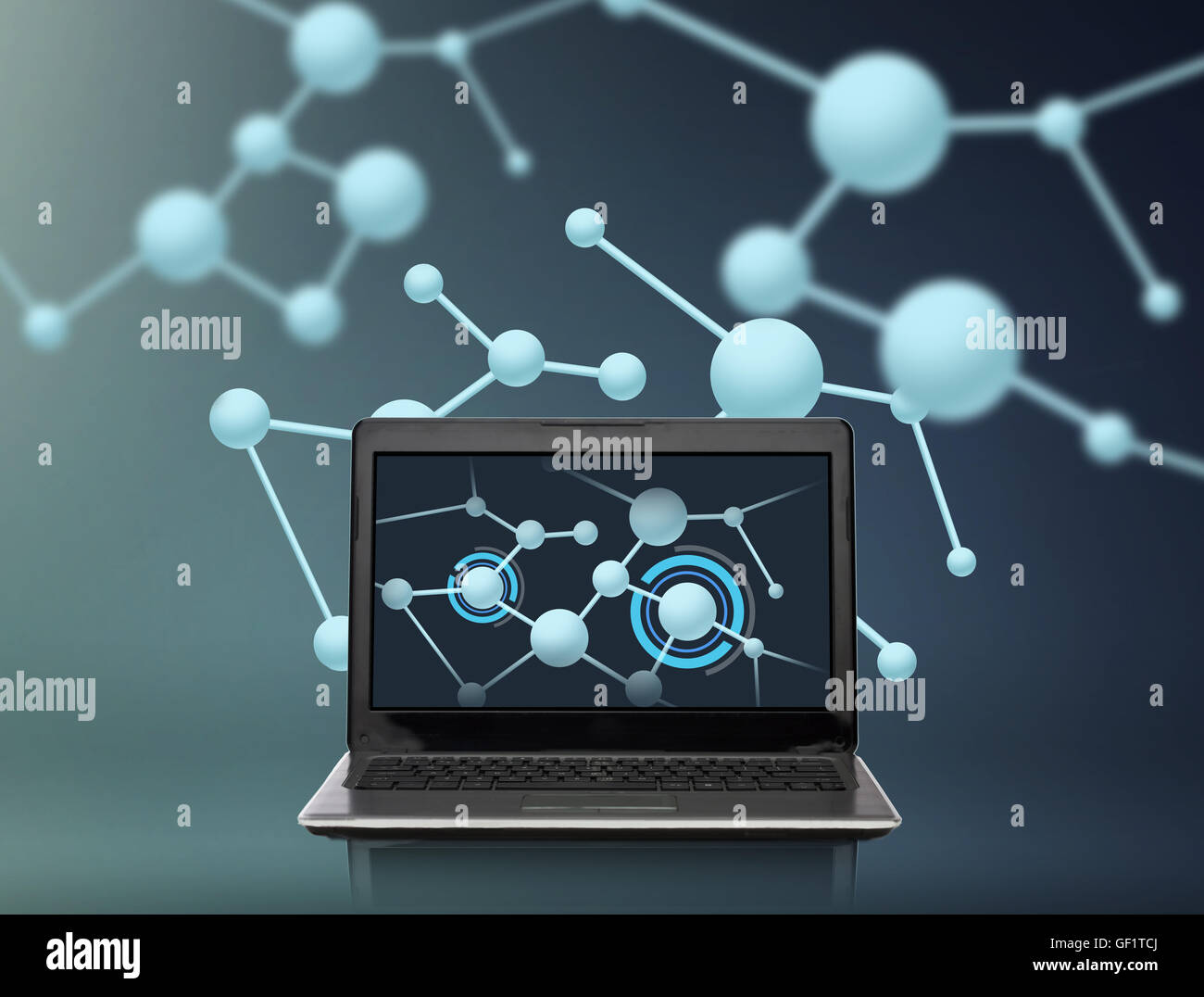 Laptop-Computer mit Molekülen Struktur auf dem Bildschirm Stockfoto