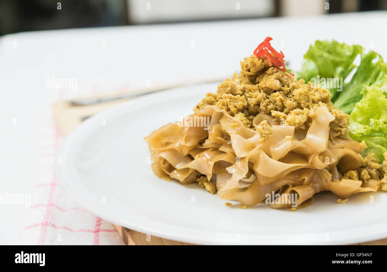 Rühren Sie gebratene Reisnudeln mit Schweinefleisch (Pad sehen Eiw) Stockfoto