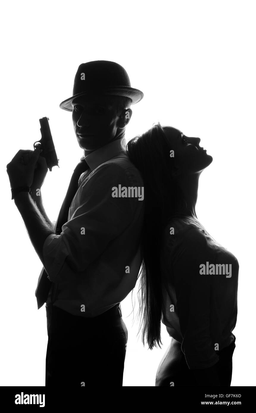 Silhouette des Detektivs mit schönen Frau isoliert auf weißem Hintergrund Stockfoto