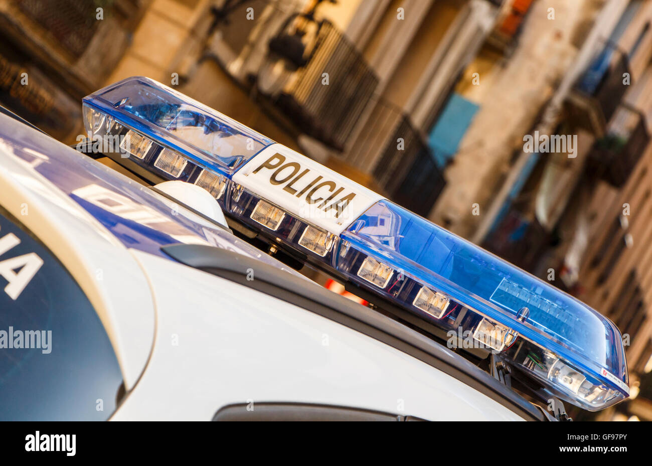 Abstrakt Polizei erschossen Autolichter mit der Polizei in Spanisch geschrieben Stockfoto