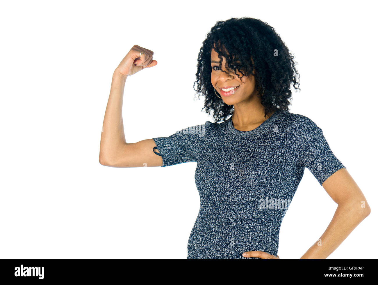 weibliches Model attraktive Frau zeigt Stärke mit Arm-curl Stockfoto