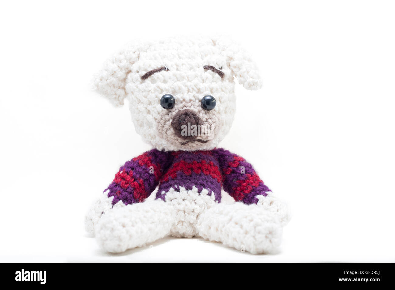 Gestrickte ausgestopften Hund auch bekannt als ein Amigurumi auf Japanisch Stockfoto