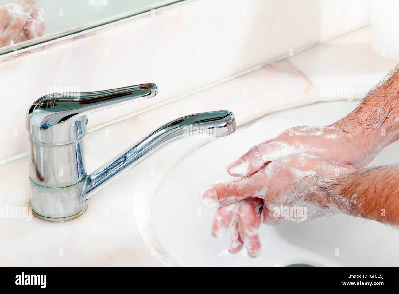 Körperpflege - Waschen der Hände, um das Risiko der Ansteckung anderer mit Schweinegrippe und anderen Krankheiten Stockfoto