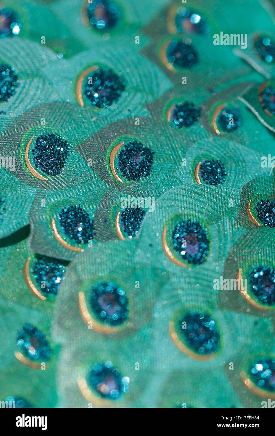Blaue grüne Pfau gefärbt Papierhintergrund mit Glitzer Stockfoto