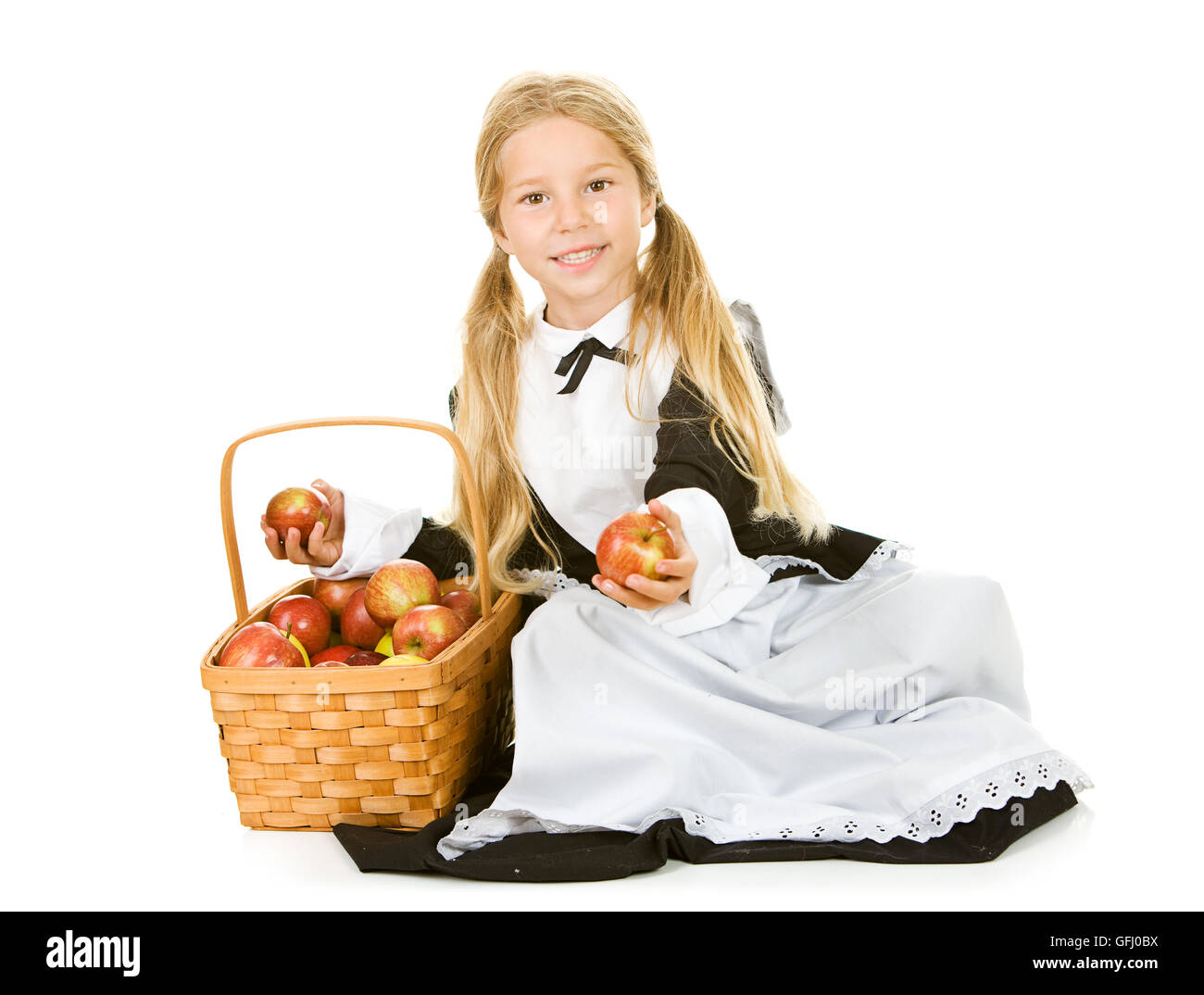 Kleines Mädchen als Thanksgiving Pilger gekleidet. Stockfoto