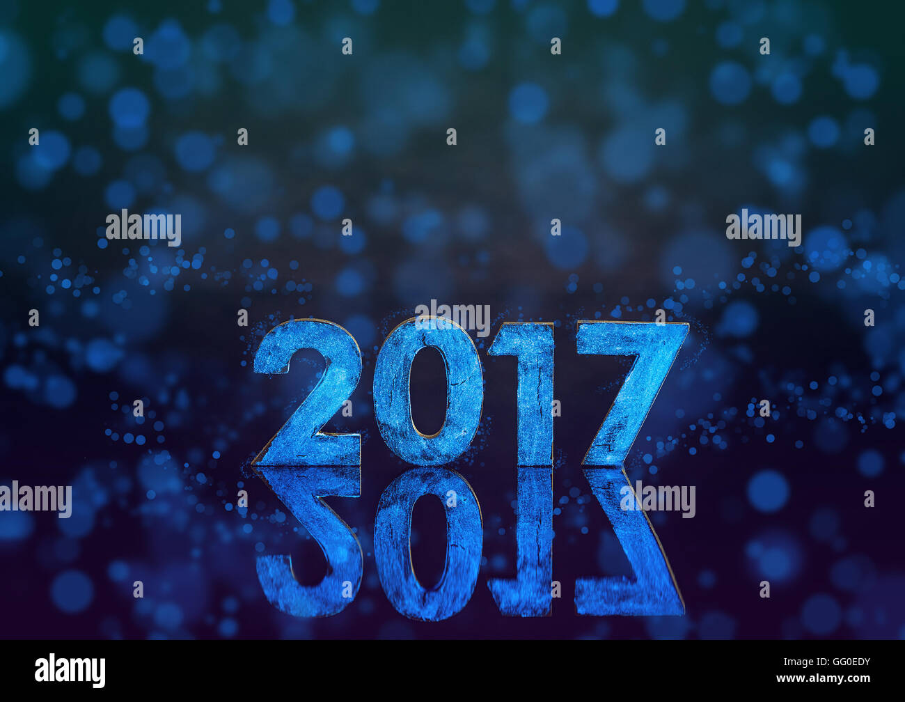 2017 phosphoreszierende Jahreszahl mit funkelnden Bokeh-Hintergrund Stockfoto