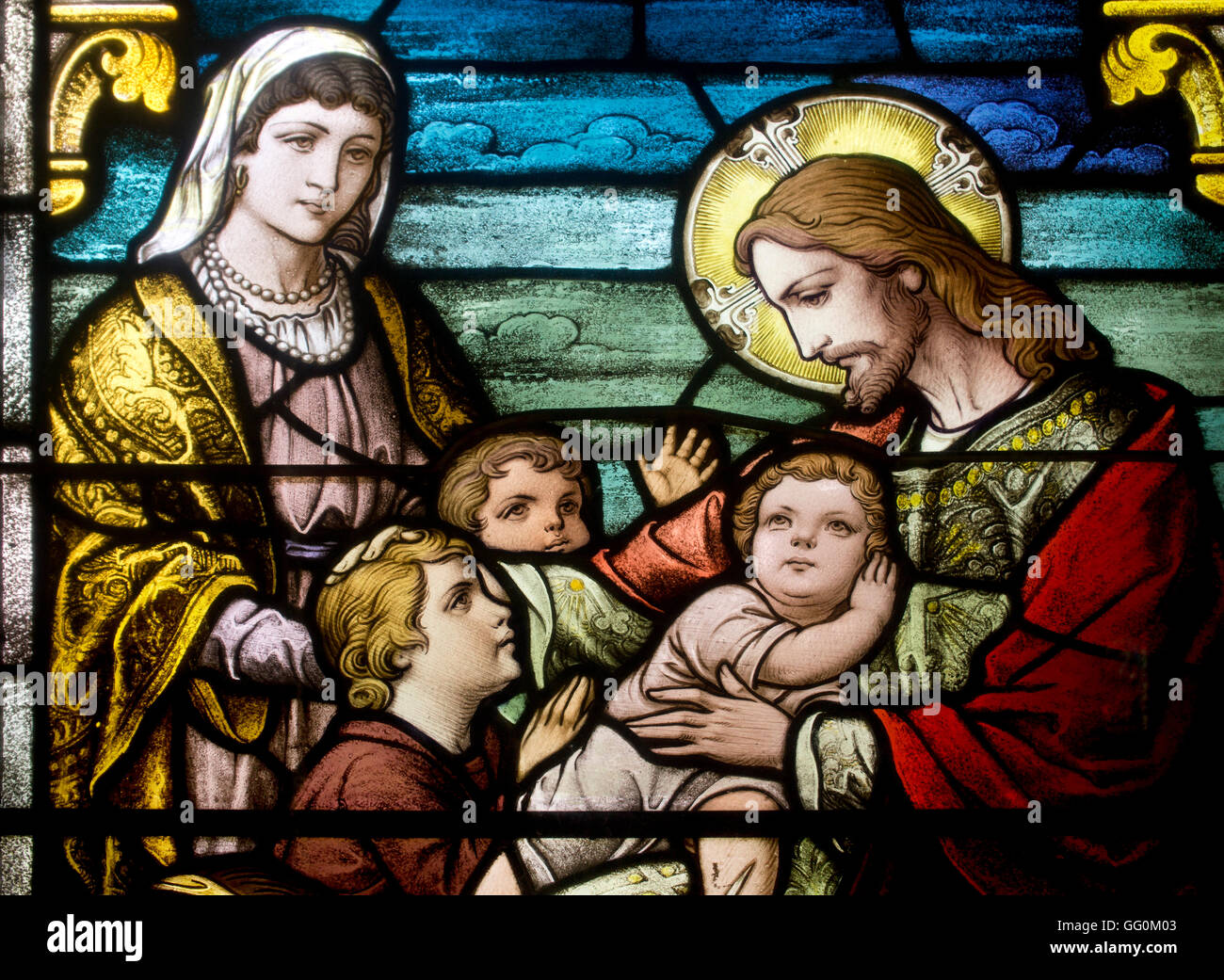 Glasmalerei-Fenster Darstellung Jesu Christi mit kleinen Kindern besuchen. Stockfoto