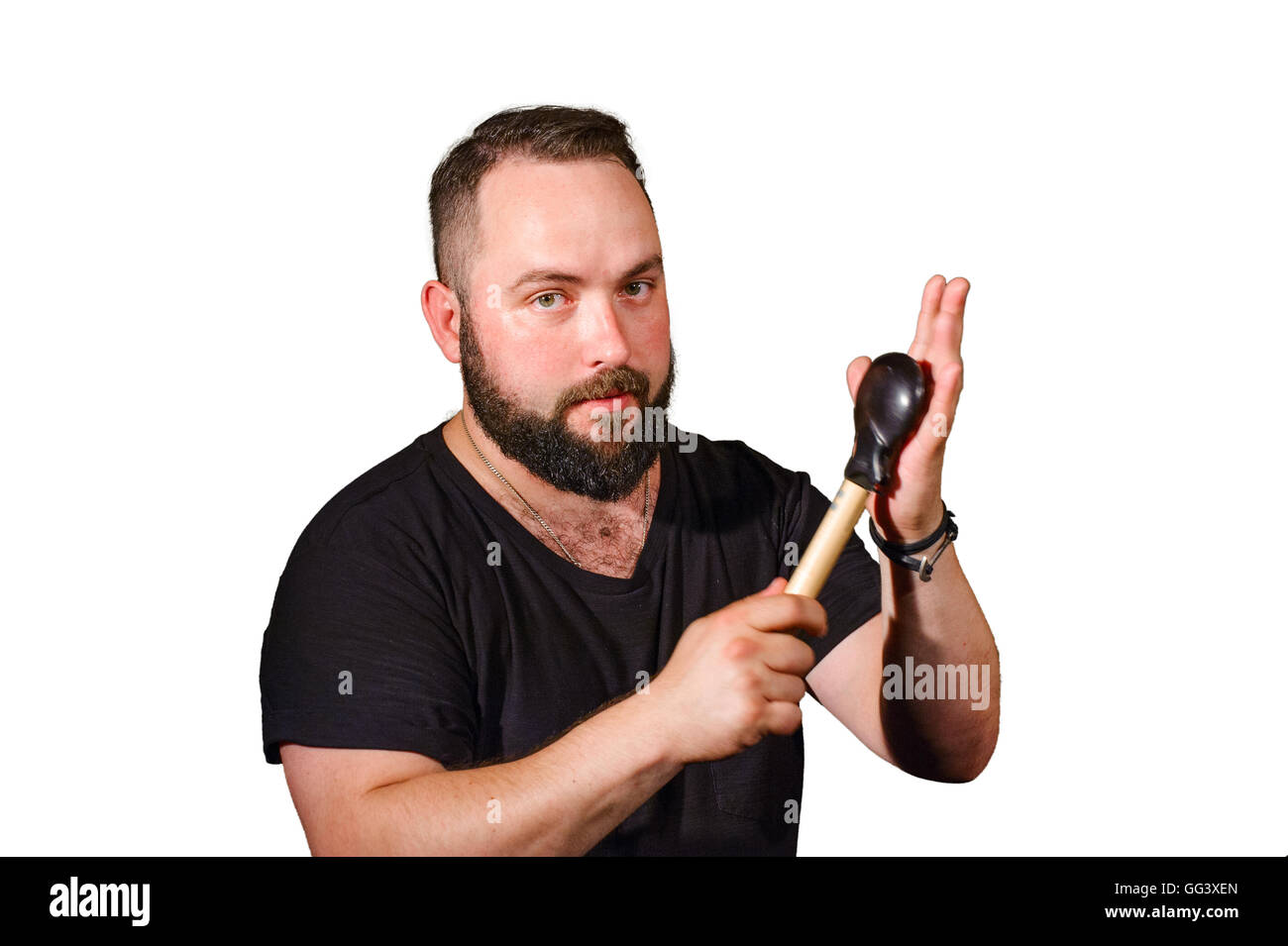 Ein Mann mit einem Bart spielen auf Perkussion Musik instruments.isolated auf weißem Hintergrund. Stockfoto