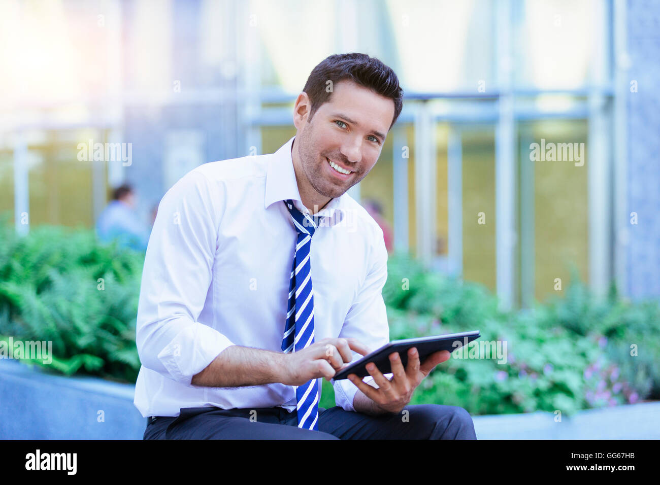 Geschäftsmann mit einem digitalen tablet Stockfoto