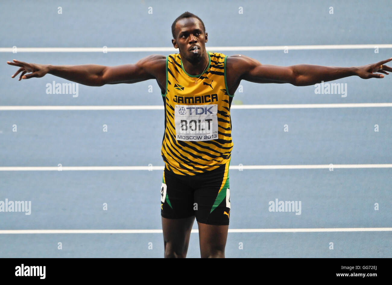 Usain Bolt stellt für die Kameras nach dem Gewinn der 100 m-Finale in Moskau, IAAF World Championships 2013 Stockfoto