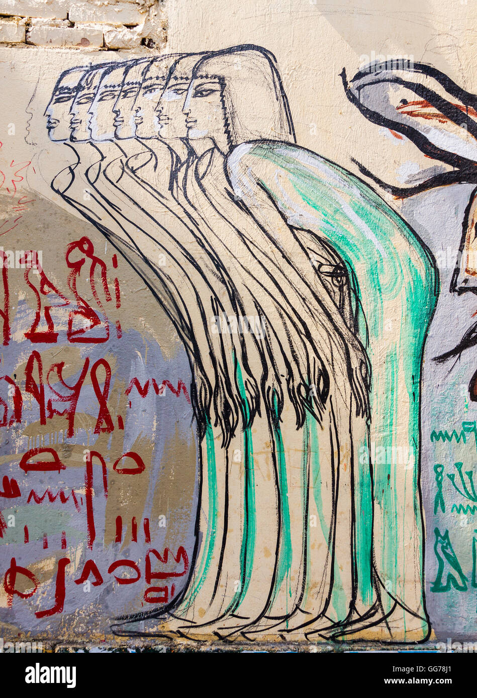 Ägypten, Kairo, Graffiti an den Wänden der American University, 7 Frauen, gefolgt von 7 Kühe Verbeugung der ägyptischen Revolution. Stockfoto
