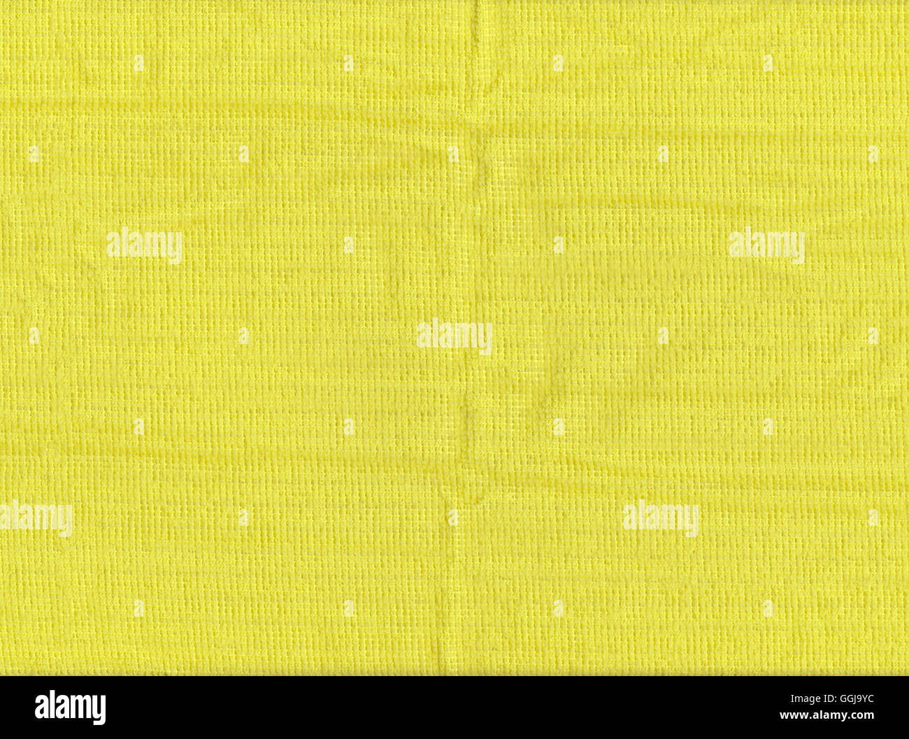 Textur des gelben Stoff oder Oberfläche von Textilien in Nahaufnahme für die Design-Hintergrund. Stockfoto