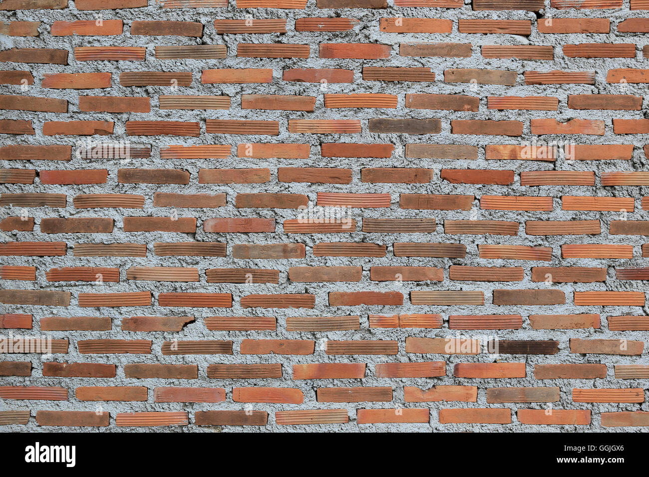 Textur der alten verwitterten Ziegelmauer zerfallen und gebrochenen Fehlfunktion für Design-Hintergrund abgebaut. Stockfoto
