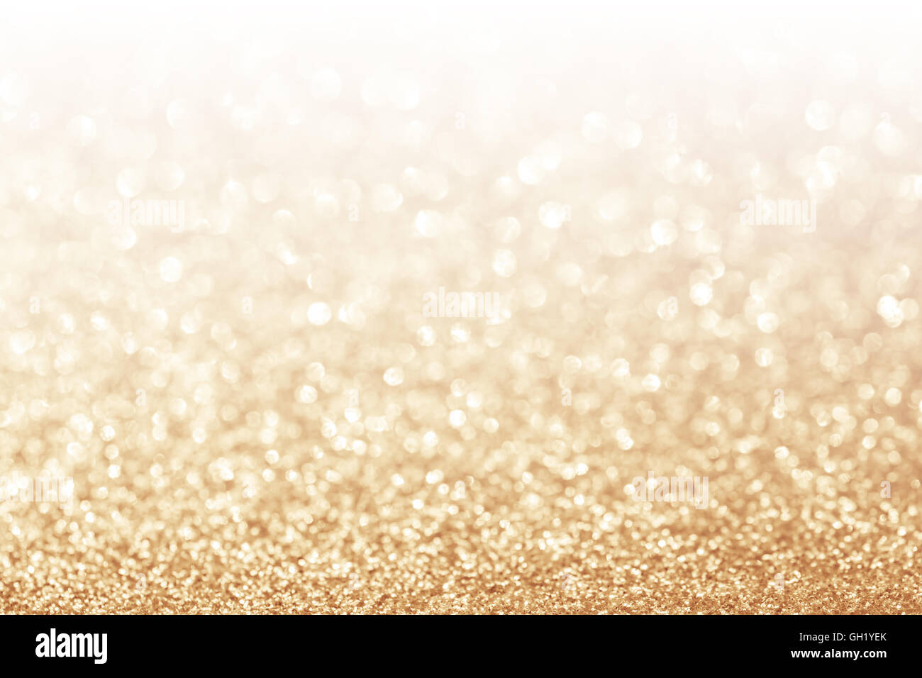 Abstrakte Glitter gold Hintergrund mit weißen Textfreiraum Stockfoto
