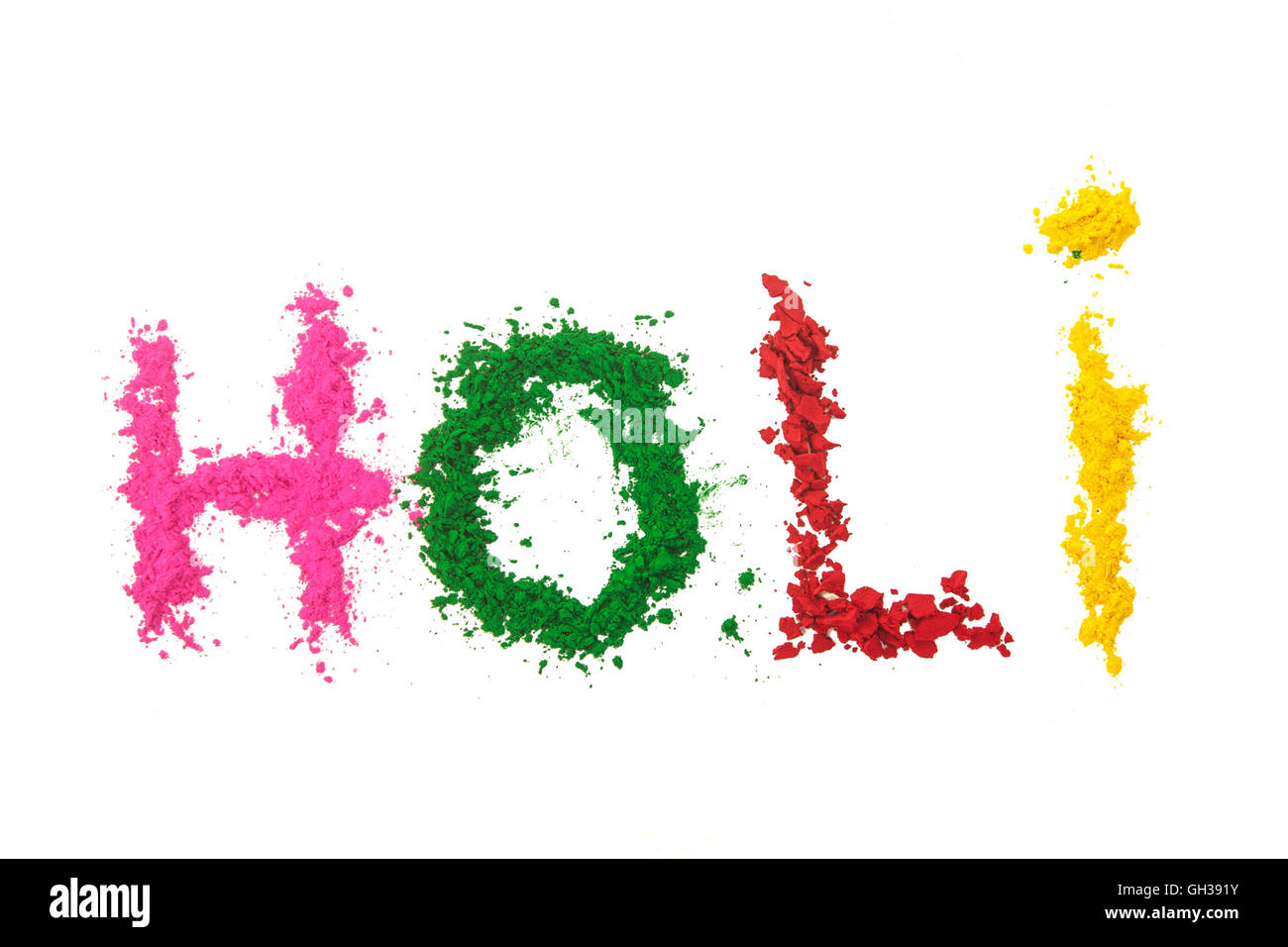 Das Wort HOLI (das indische fest der Farben) mit verschiedenen farbigen Farbstoff Pulver ausgeschrieben. Stockfoto