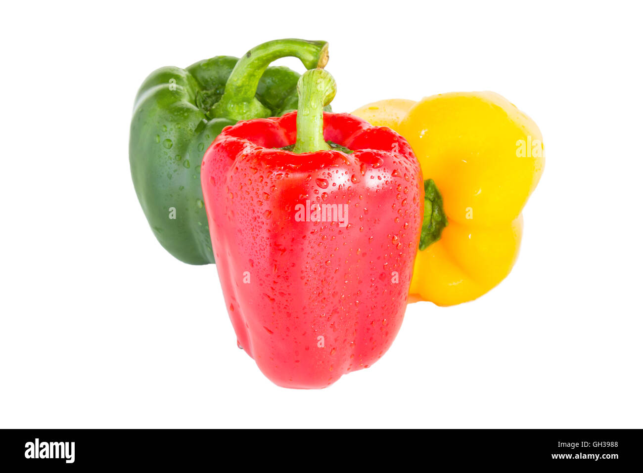 Paprika drei Farben rot, gelb und grün isoliert auf weißem Hintergrund. Clipping-Pfad in Bild. Stockfoto