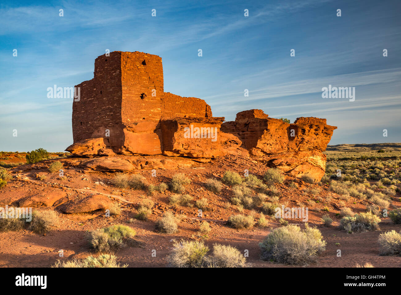 Wukoki Pueblo Ruine bei Sonnenuntergang, Wupatki National Monument, Arizona, USA Stockfoto