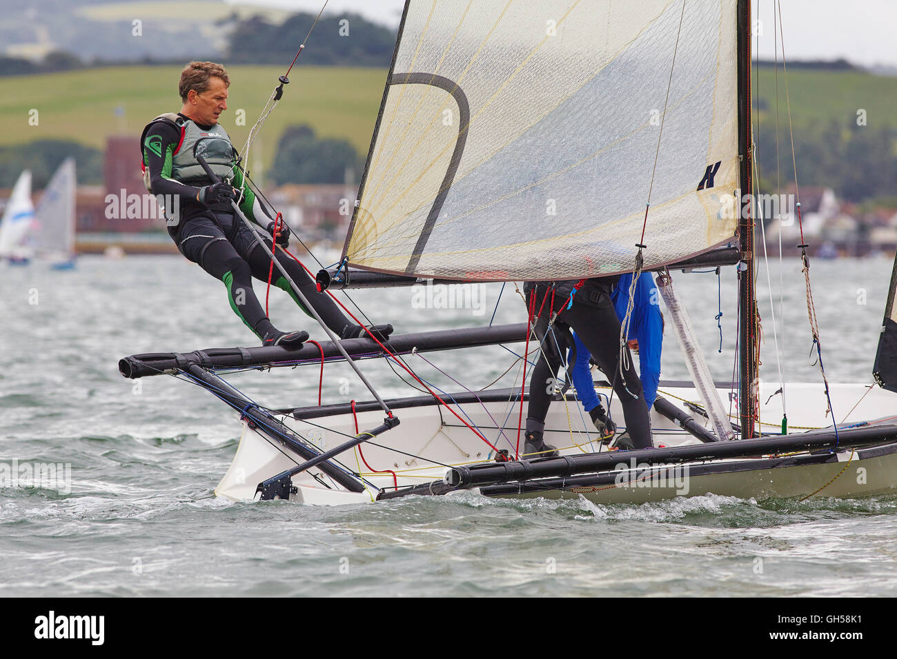Wettbewerbsfähige Jolle racing in der Mündung des Flusses Exe, Süd Küste von Devon, Südwestengland, Großbritannien. Stockfoto