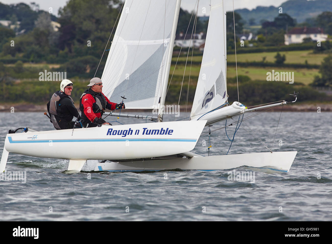 Wettbewerbsfähige Jolle racing in der Mündung des Flusses Exe, Süd Küste von Devon, Südwestengland, Großbritannien. Stockfoto