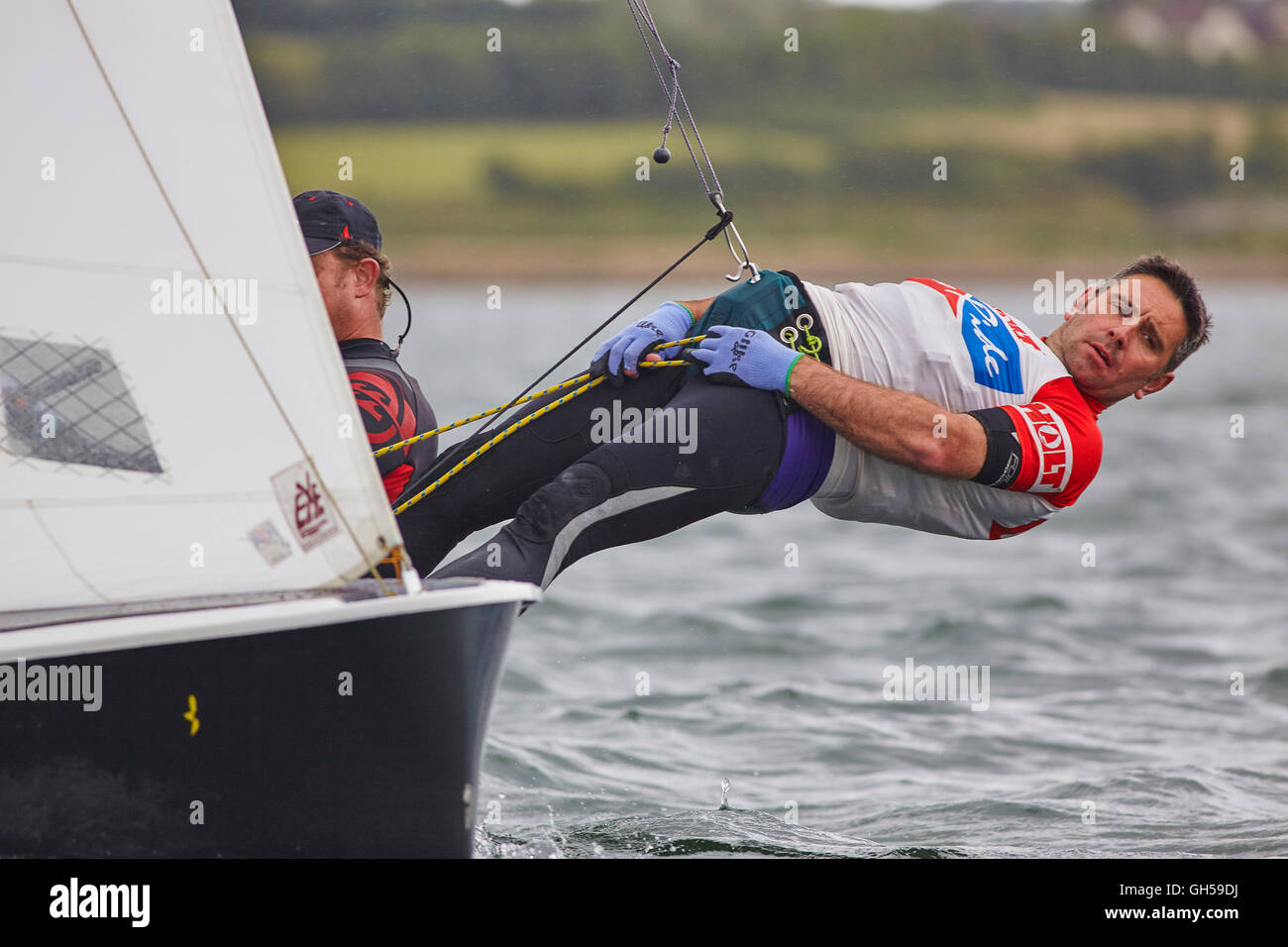 Wettbewerbsfähige Jolle racing in der Mündung des Flusses Exe, Süd Küste von Devon, Südwestengland, Großbritannien. Stockfoto