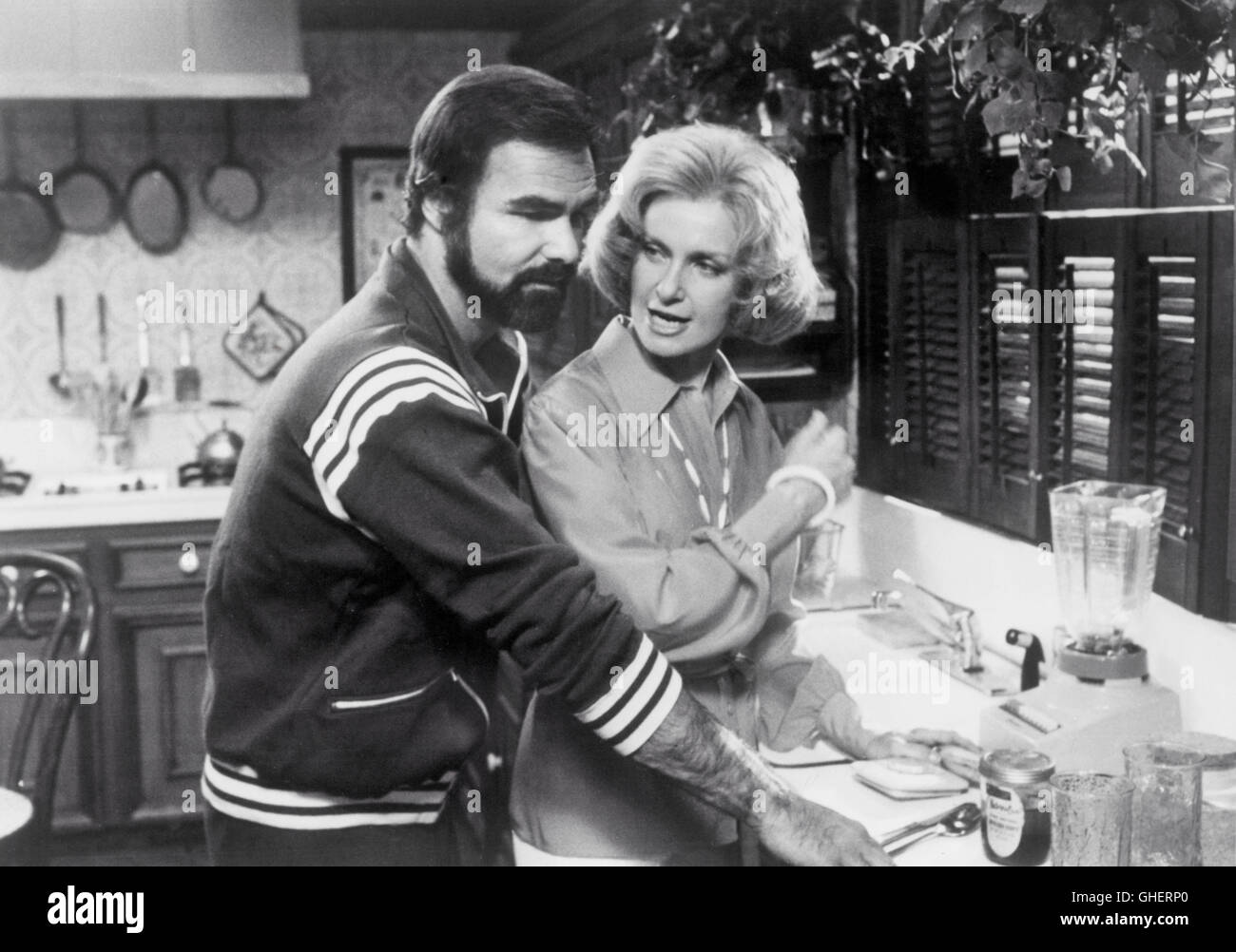 DIE USA Ende 1978 Burt Reynolds-Küche-Szene: Invasion der gepflegten Küche von seiner Ex-Frau, Jessica (JOANNE WOODWARD) Sonny Lawson (BURT REYNOLDS) findet, dass er eine unwillkommene Besucher. Regie: Burt Reynolds Stockfoto