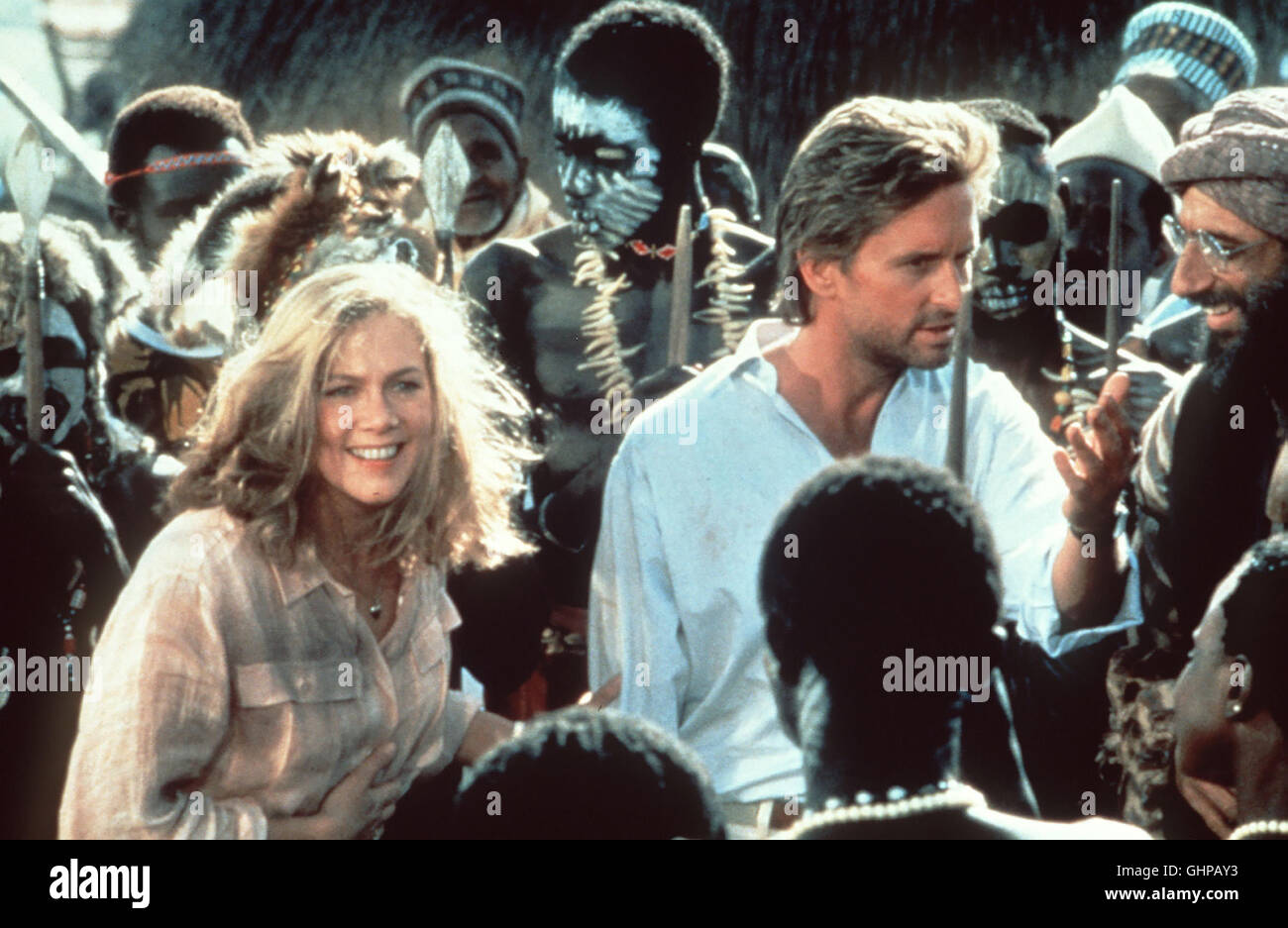 Auf der Jagd Nach Dem Juwel Vom Nil Als Jack Erfährt, Daß der Machtlösterne Omar Mit Hilfe des "Juwelen" sterben Kontrolle Über Den Orient Erlangen wird, Macht er Sich Zusammen Mit Dem Ganoven Ralph Auf Die Suche Nach Dem Ihres Stein Und Semesters Dabei Zu Joan Zurück... Bild: Joan (KATHLEEN TURNER), Jack (MICHAEL DOUGLAS), Heiliger Mann (AVNER EISENBERG) Regie: Lewis Teague aka. Die Jewel of the Nile Stockfoto