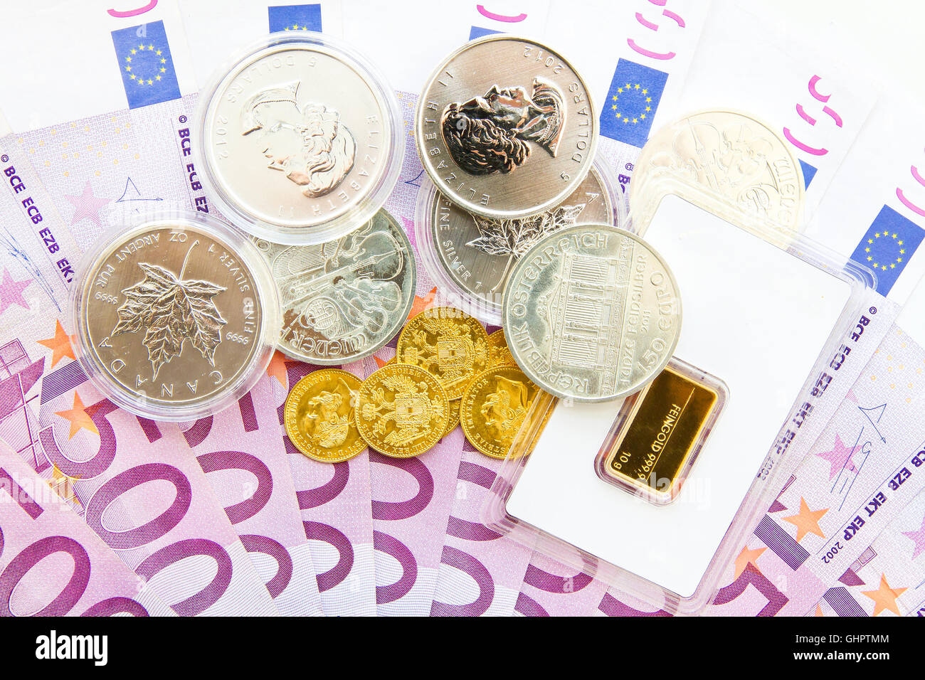 Silber, Gold und Euro-Banknoten Stockfoto