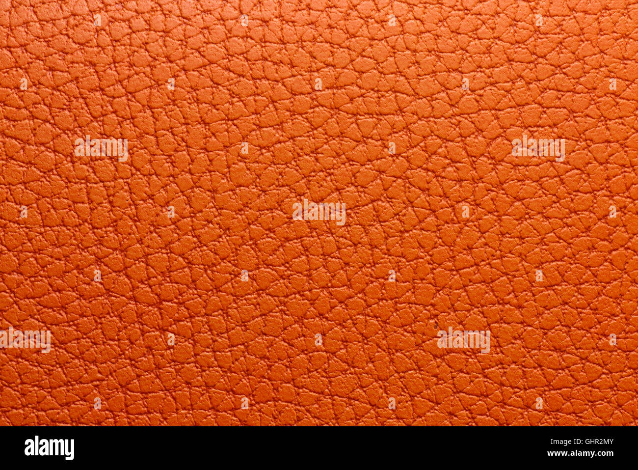 Nahaufnahme von orange Leder Textur Hintergrund Stockfoto