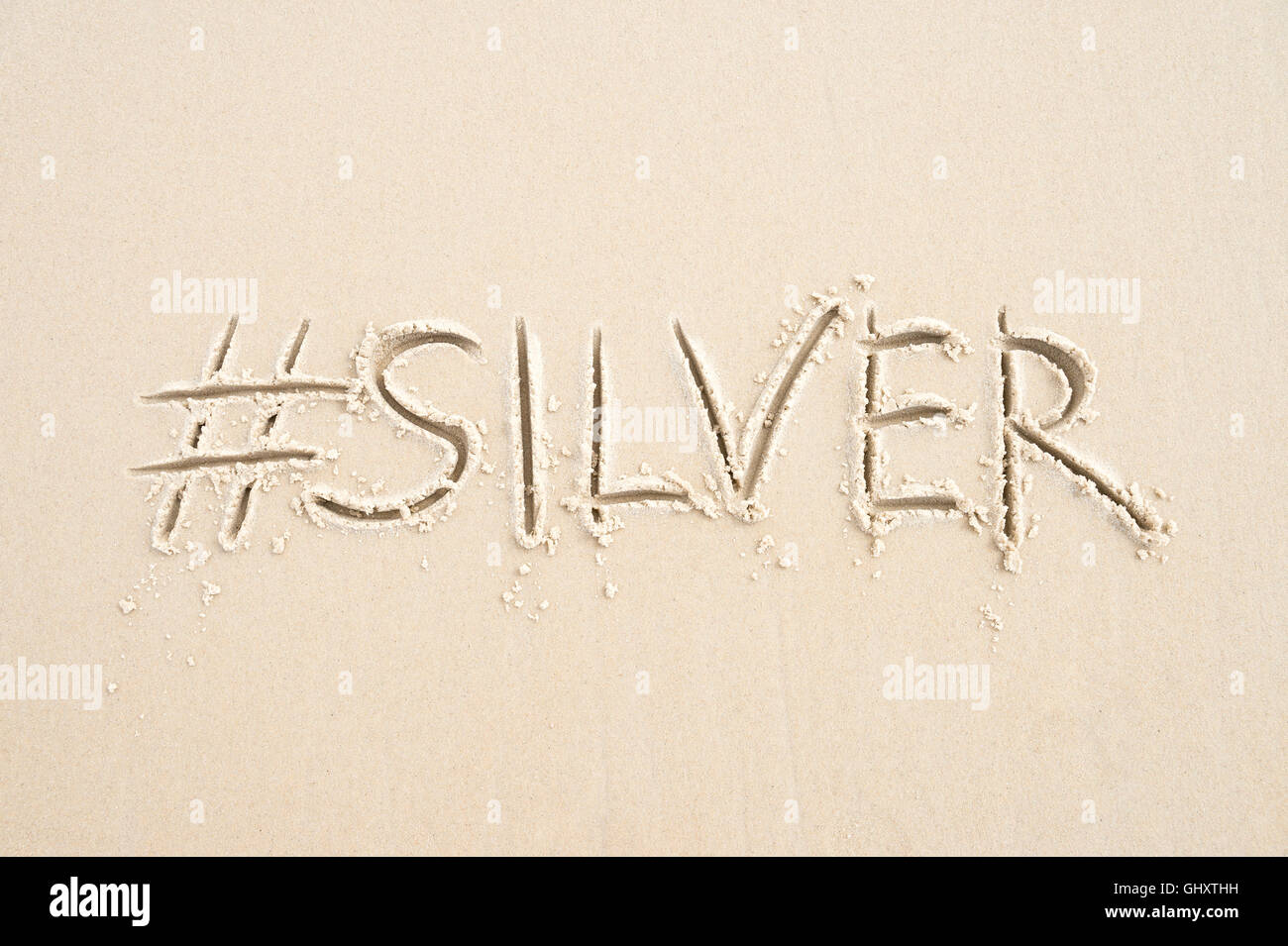 Hashtag-social Media-Nachricht für die Silbermedaille, Sport den zweiten Platz, geschrieben im Sand am Strand von Rio De Janeiro, Brasilien Stockfoto