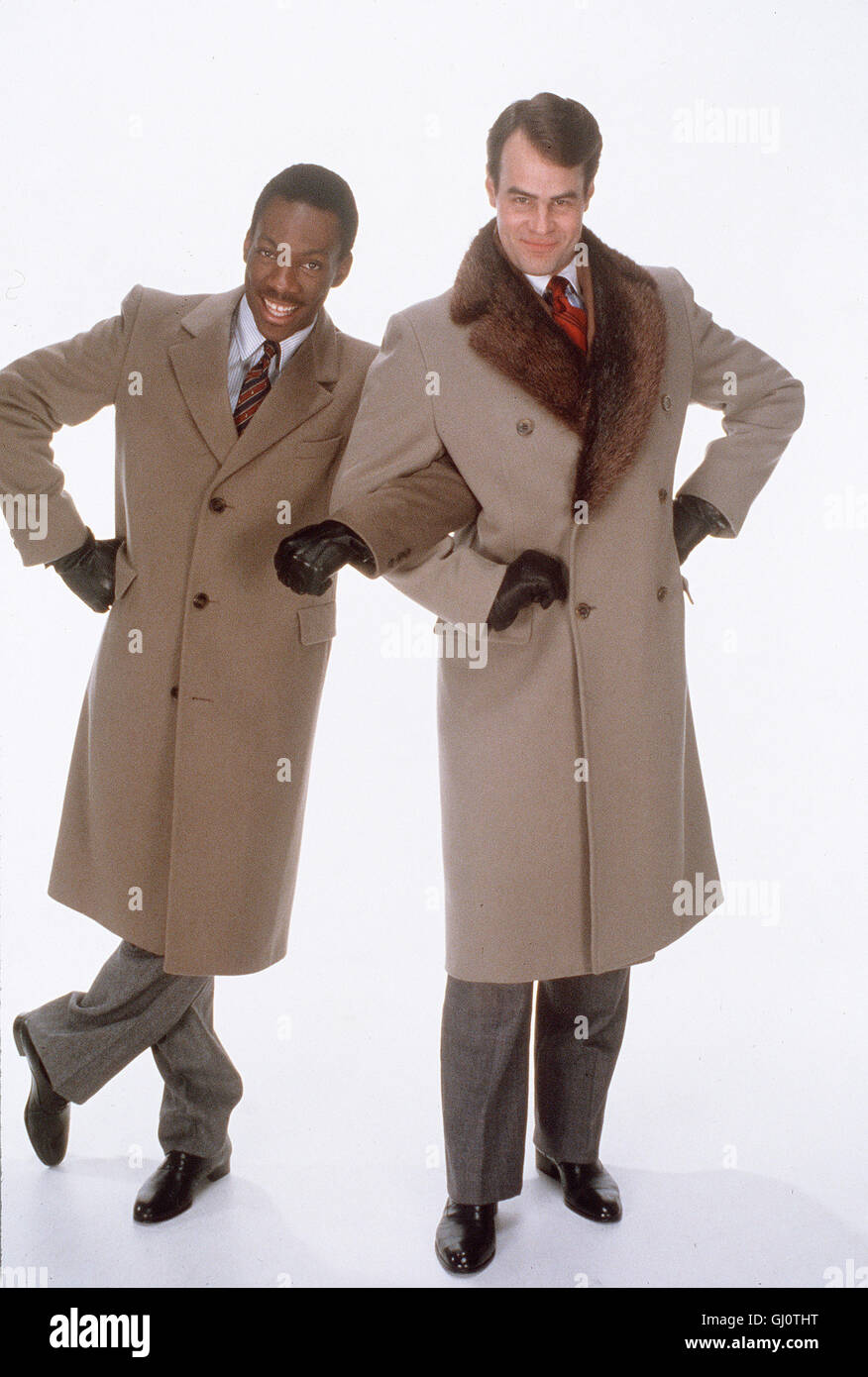 STERBEN GLÜCKSRITTER - Aufgrund Einer Üblen Wette von Zwei Kauzigen Finanzmagnaten Verliert der Erfolgreiche Jungmanager Louis Winthorpe III Über Nacht Job, Haus Und Vermögen. Im Gegenzug Wird der Kleine Schwarze Gauner Billy Ray in Die Chefetage Geholt... Szene Mit DAN AYKROYD (Louis Winthorpe III), EDDIE MURPHY (Billy Ray) Regie: John Landis aka. Handelsplätze Stockfoto