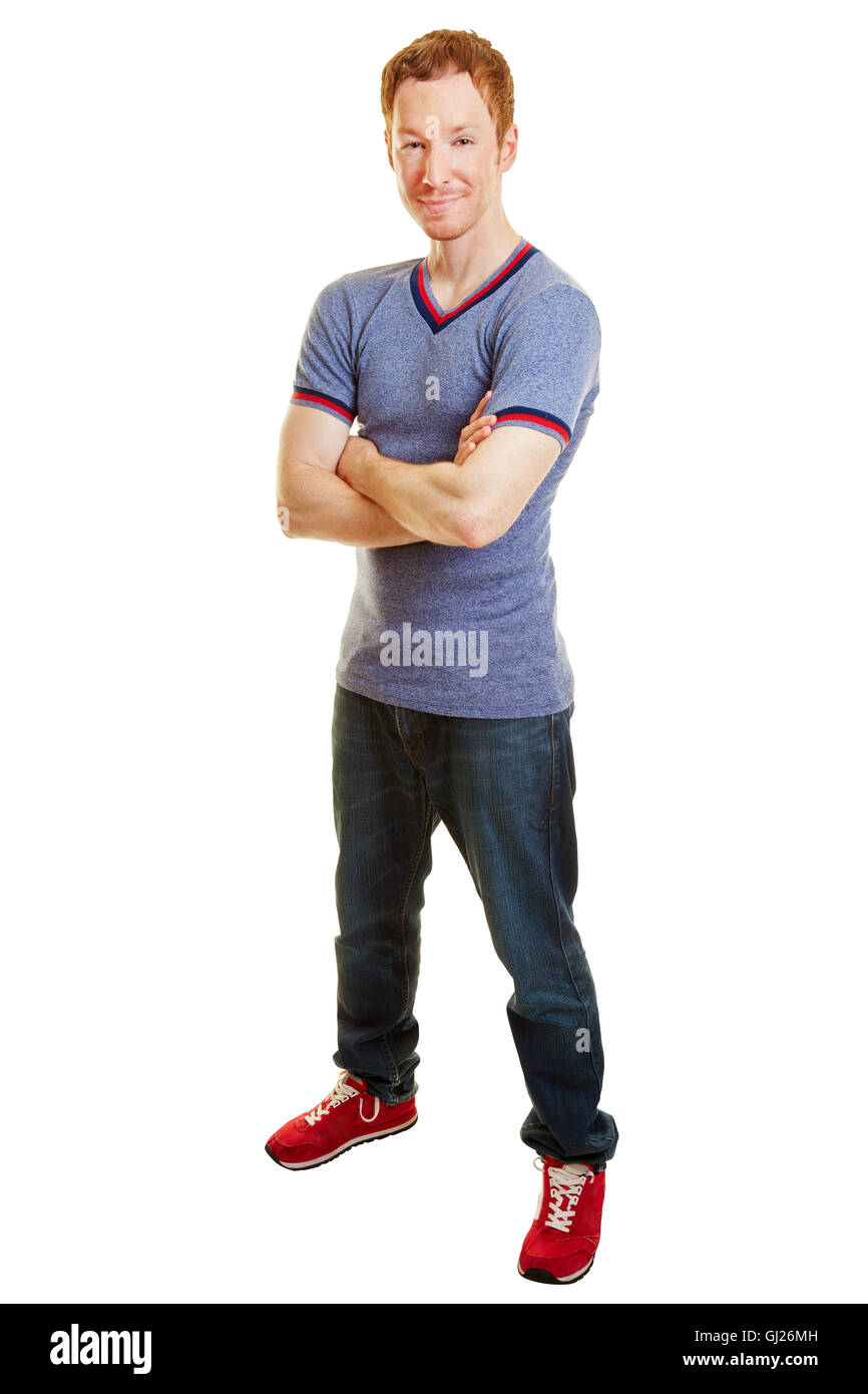 Lässige Porträt eines Sportlers mit seinem Armes gekreuzt mit jeans Stockfoto