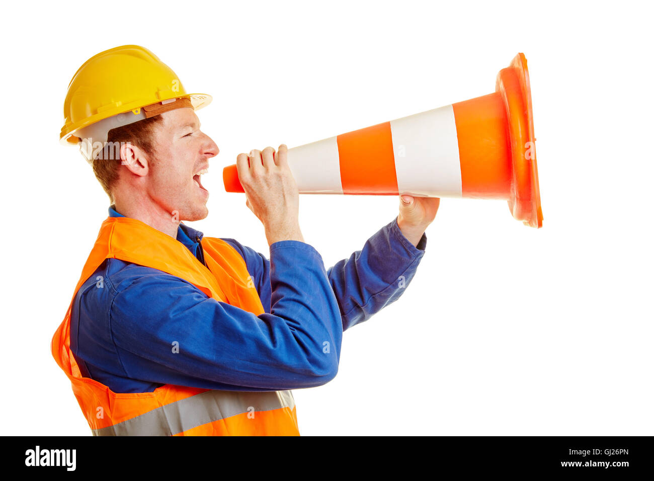 Bauarbeiter mit einem Verkehr Kegel und eine Warnweste schreien Stockfoto