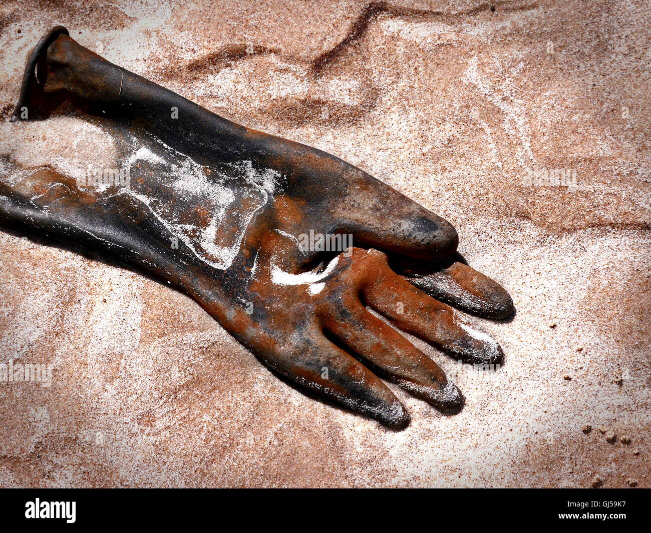 Gegossen-away Handschuhe Stockfoto