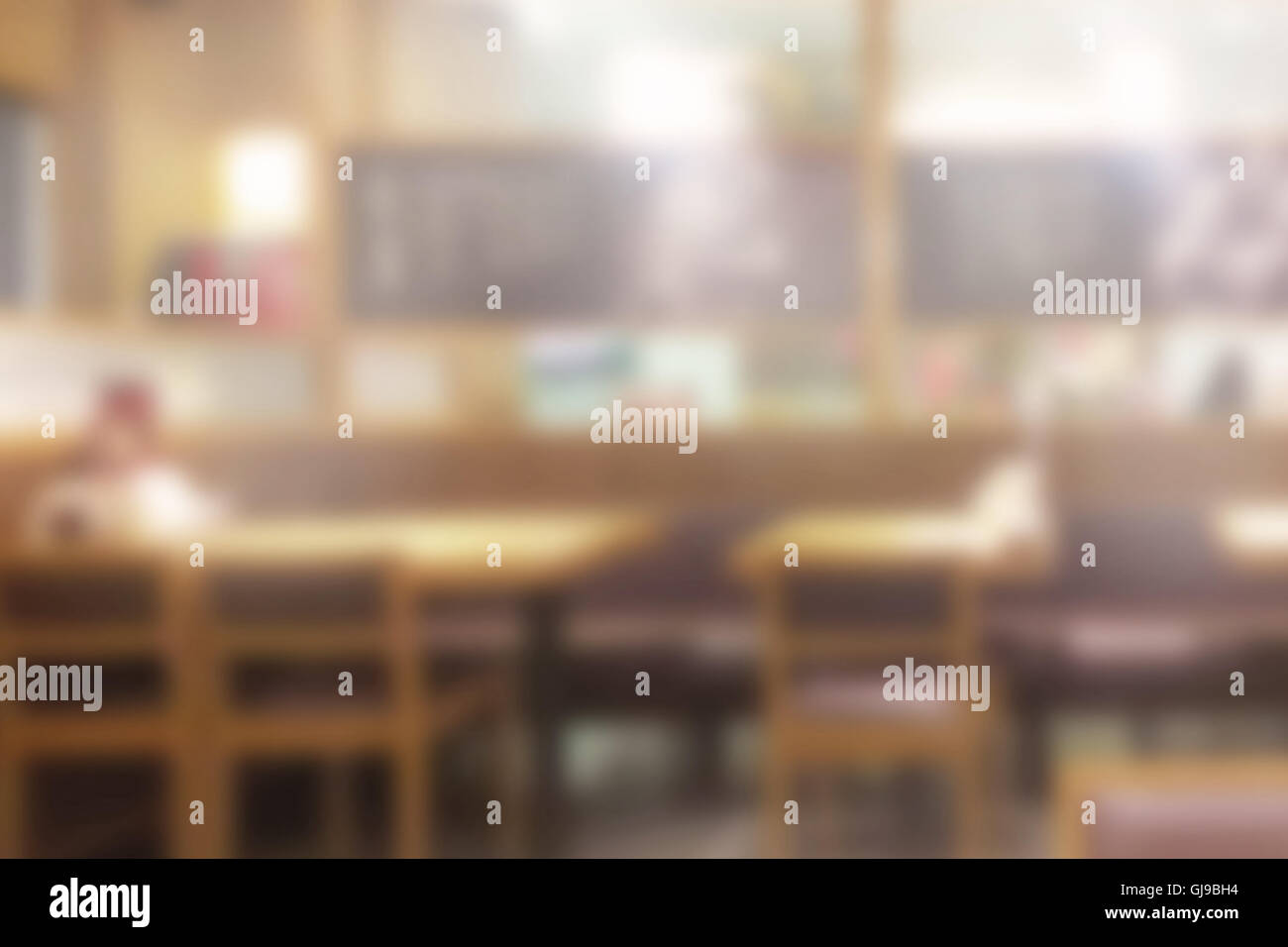 Esszimmer, unscharf Hintergrund mit warmem Licht. Stockfoto