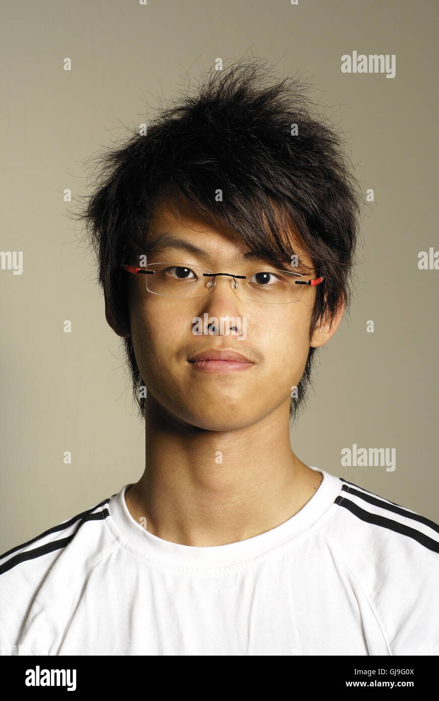 Junge asiatische Mann Porträt Stockfoto