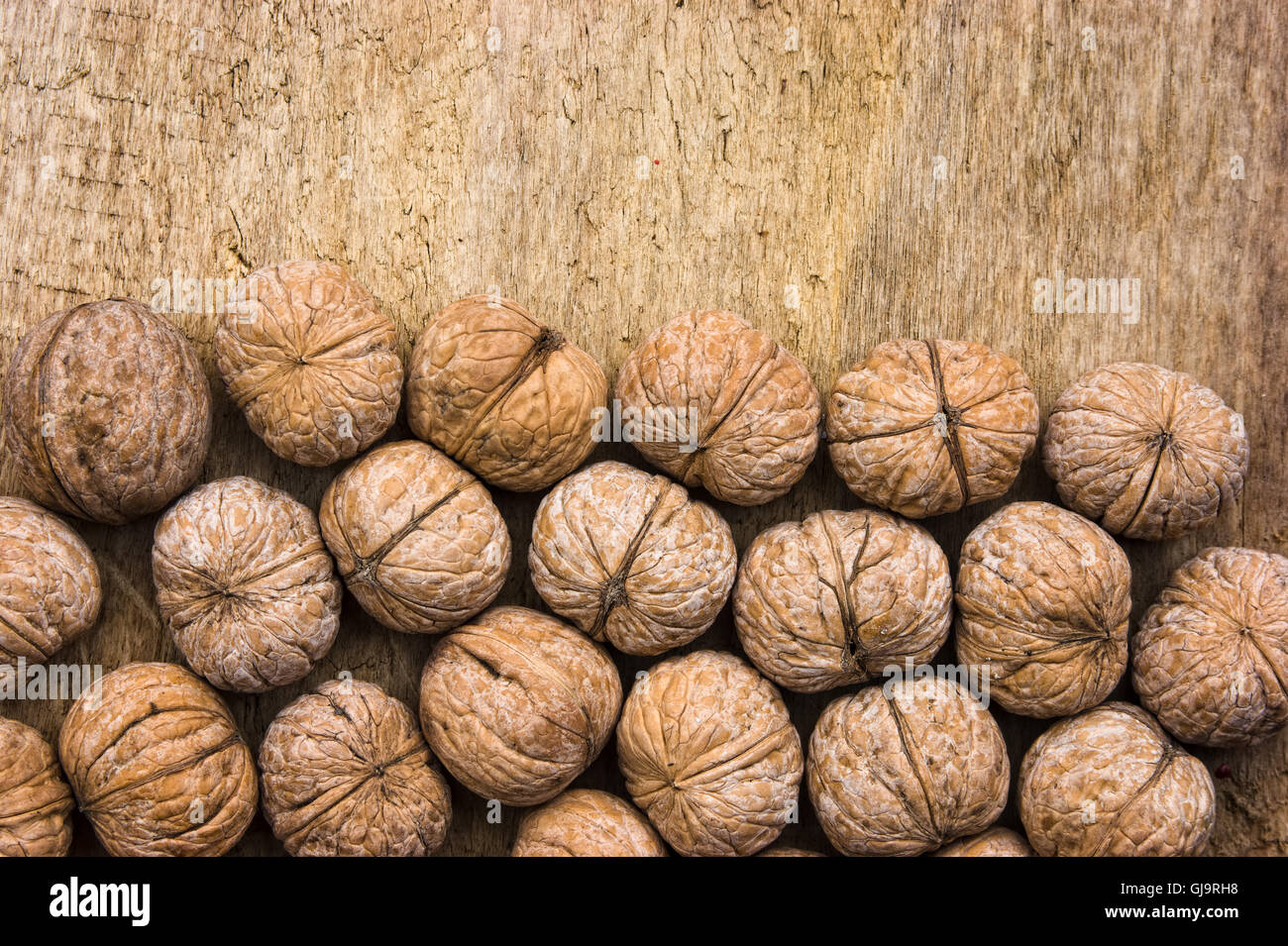 Hintergrund der Walnüsse Stockfoto