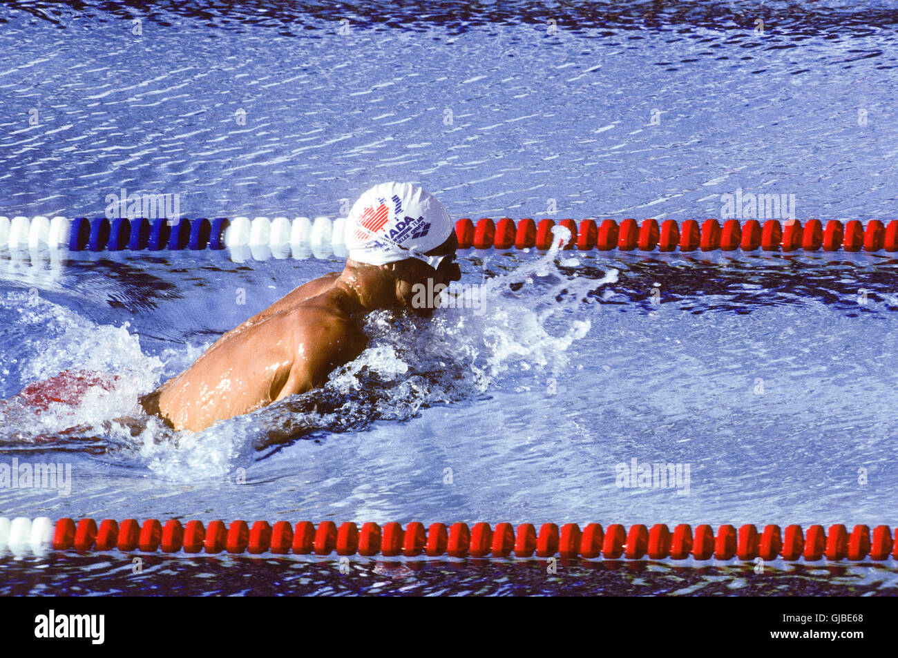 Kalifornien - Los Angeles - 1984 Olympischen Sommerspiele. Men es schwimmen. Kanadische Alex Baumann, 400m Lagen, Goldmedaille Stockfoto