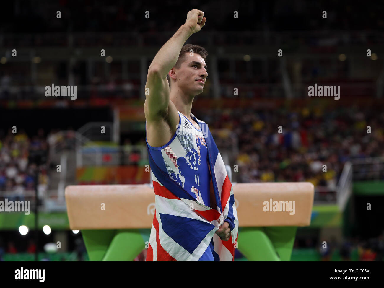 Am neunten Tag der Olympischen Spiele in Rio, Brasilien feiert Großbritanniens Max Whitlock gewinnen Gold am Pauschenpferd. Stockfoto
