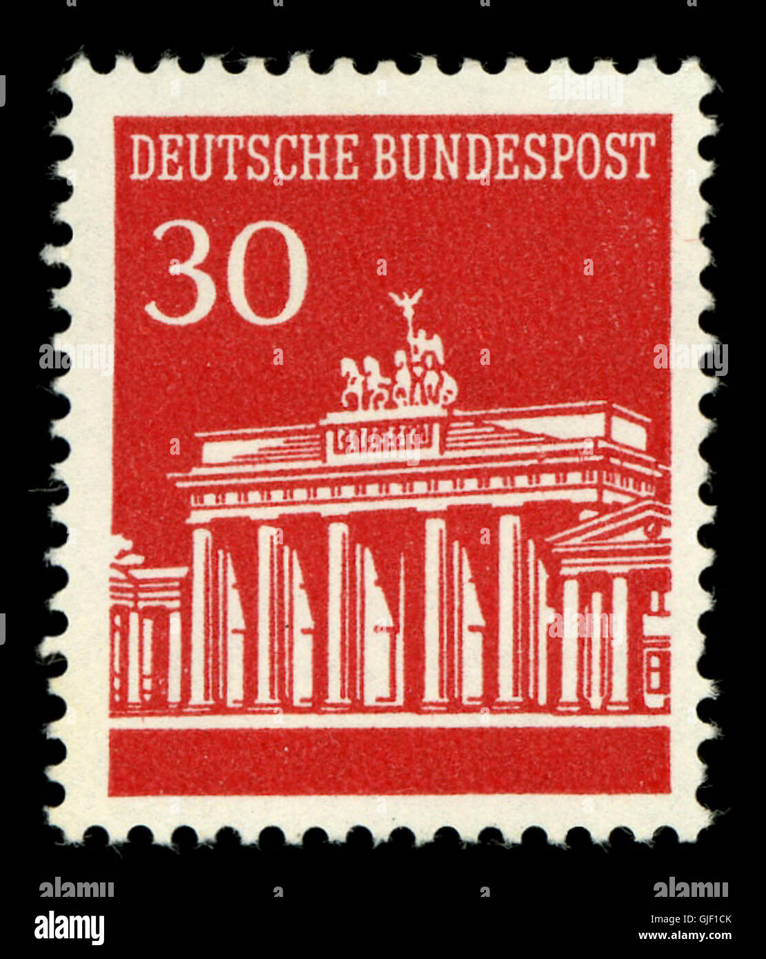 Die Pfennig Deutsche Bundespostmarke von 30 zum Gedenken an das Brandenburger Tor, ein Symbol der deutschen Einheit, unterstreicht die historische Bedeutung dieses Denkmals. Stockfoto