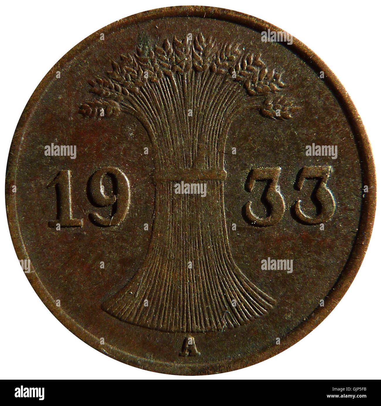 Diese Münze, der 1. Reichspfennig von 1933, stellt das Geldsystem des Nazi-Deutschlands dar und zeigt das Design und die symbolische Bildsprache der Zeit. Stockfoto